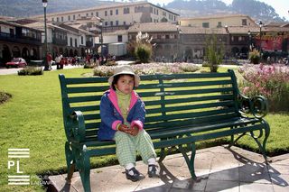 Little Girl on a Bench. - 